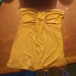 Mustard colored sleeveless shirt